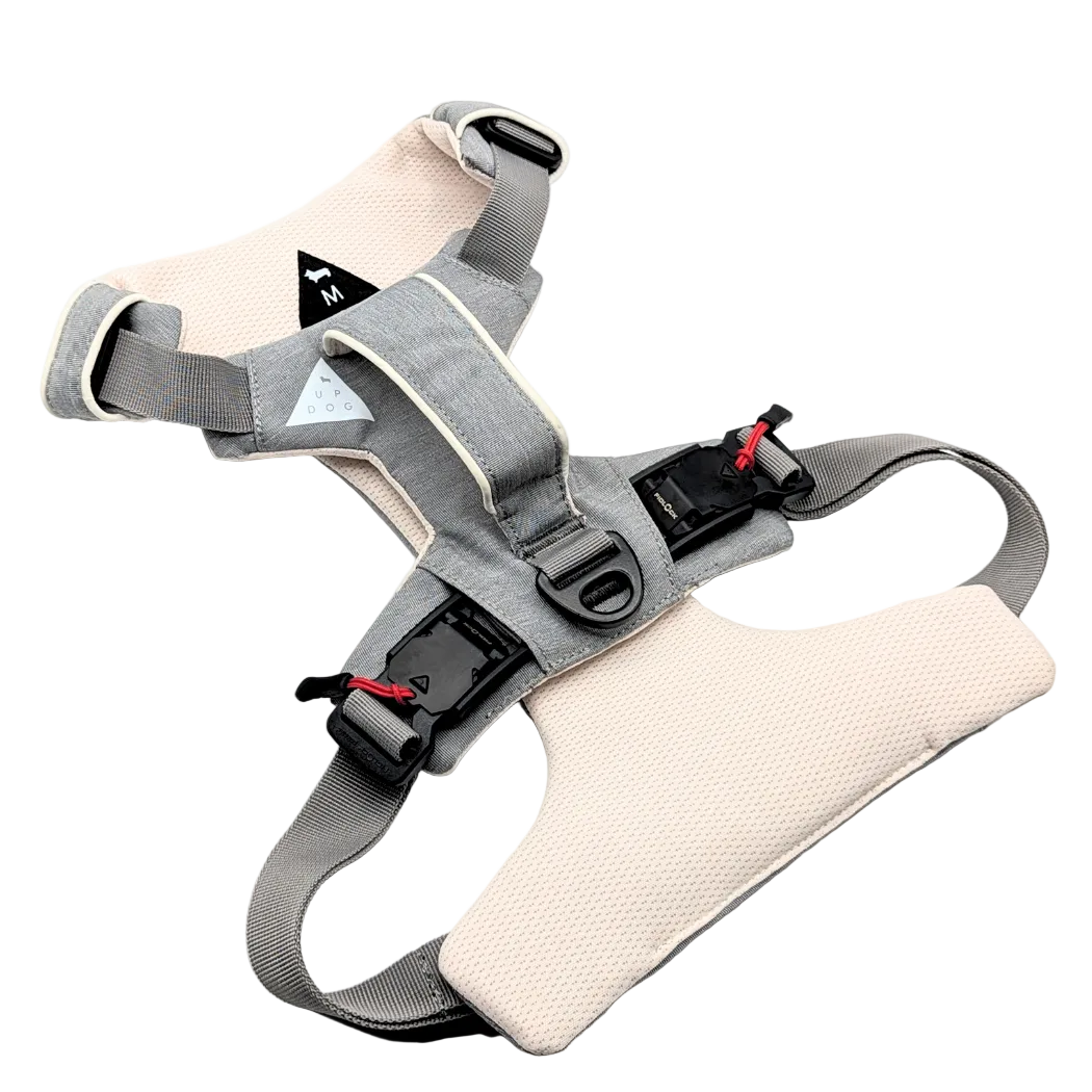 Gray and beige safety harness on a white background