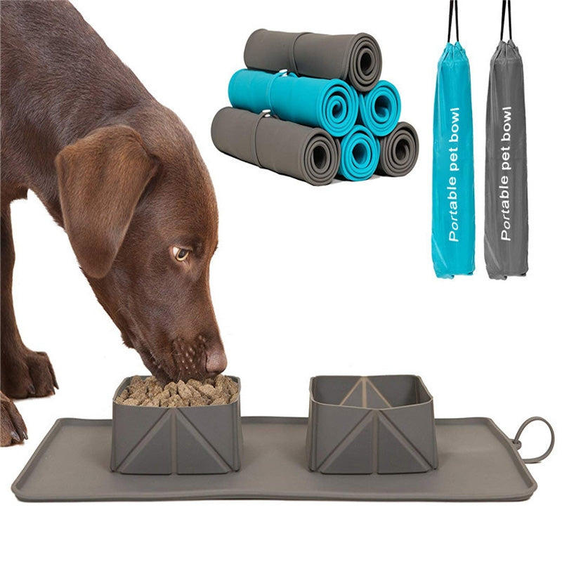 Dog eating from a portable pet bowl on a mat, with additional mats and a carrying bag displayed.